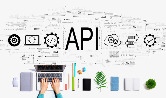 Api - application programming interface concept with person using a laptop